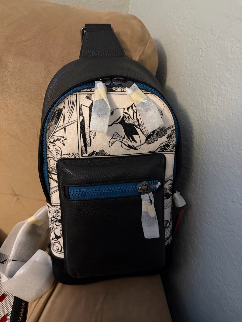 Coach marvel Black Comic-Print Men’s Sling Bag with Blue Zipper